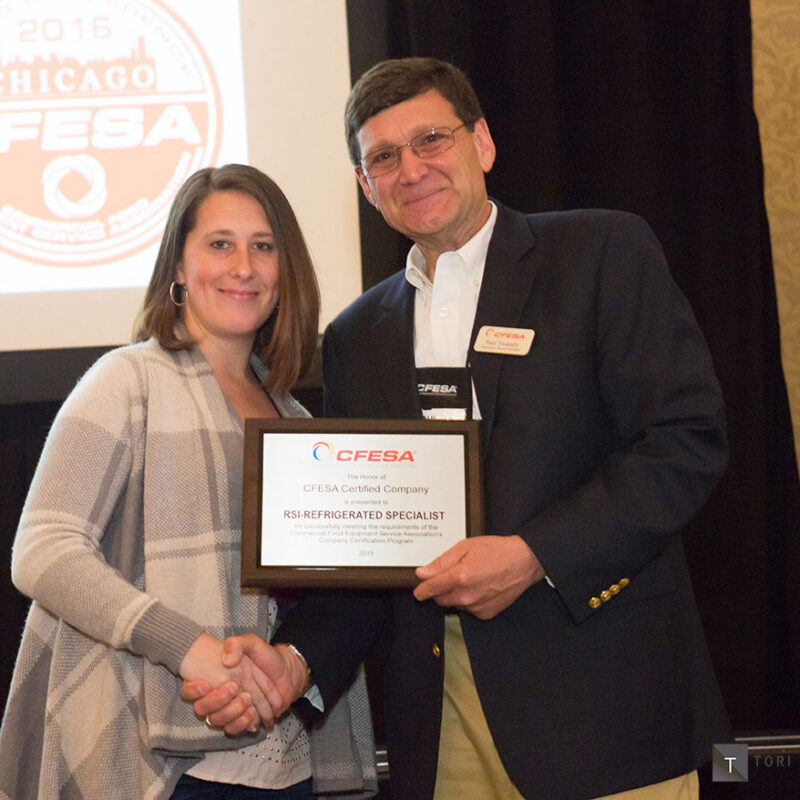 Katie Green Receiving an Award for being a CFESA Certified Company