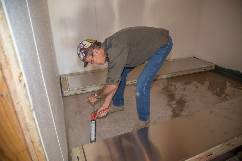Chic-Fil-A Walk-In installing floor